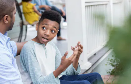 Child and parent have lively conversation