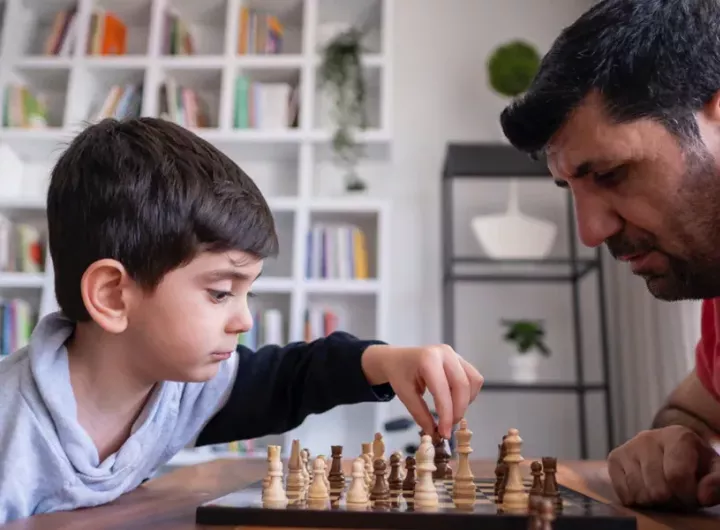 img-father-and-son-playing-chess-1200x630px2x.webp